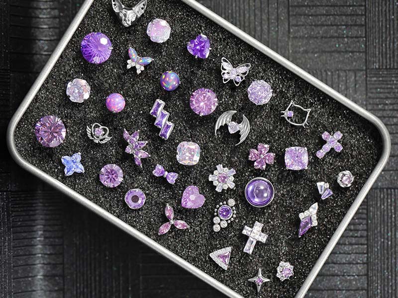 Body piercing jewelry collection -- rings, barbells, studs